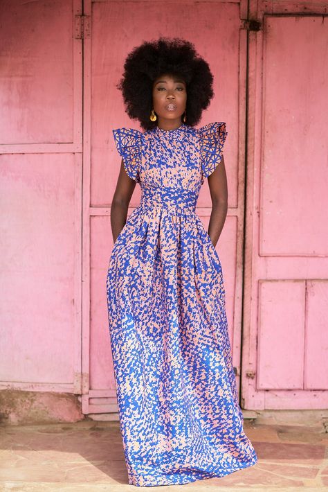 model wearing an african print dress