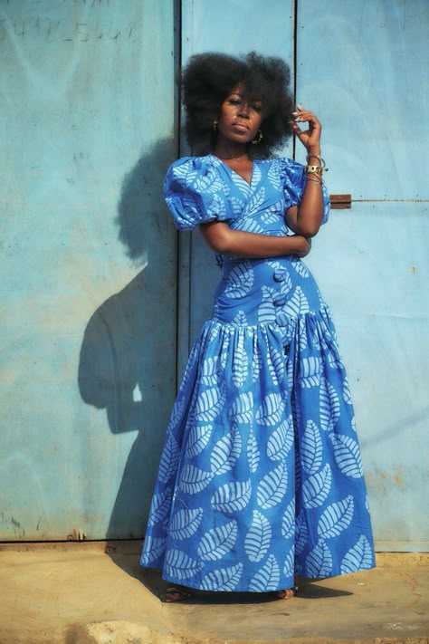 model wearing an african print dress